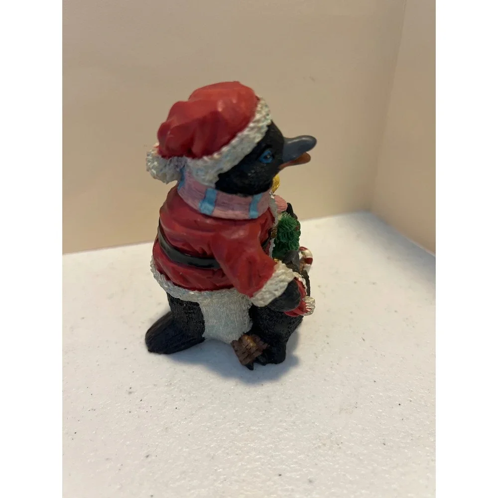 Christmas Santa Penguin Figurine with Baby Penguin and Holiday Sack Resin Decor